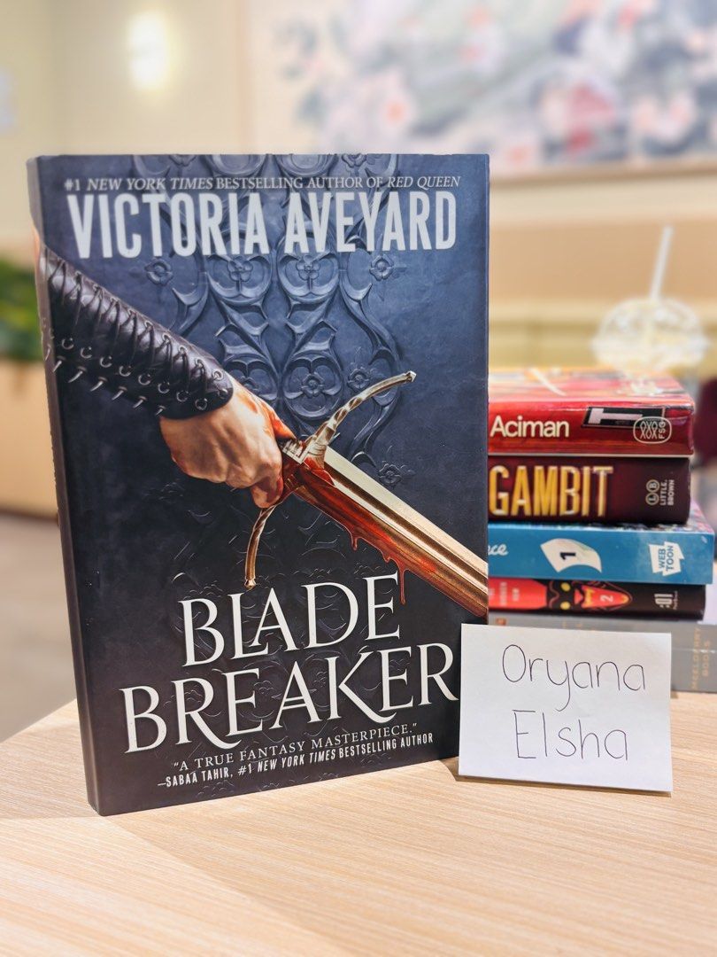 Blade Breaker by Victoria Aveyard (Category: Storybooks) located in Manila. Submitted by yanastash (Listing ID 1470515085, Image 1). Description: - Title: Blade Breaker by Victoria Aveyard - Genre: Fantasy Fiction - Format: Hardcover with black dust jacket - Condition: Read once, clean pages, well-maintained spine and covers - Storage: Properly stored on a shelf, great for collection.