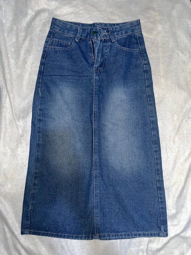 Blue denim midi skirt with back slit (Category: Skirts) located in Legazpi City. Submitted by chynnunez (Listing ID 1470427975, Image 1). Description: - Style: Medium wash denim midi skirt with a classic straight cut - Closure: Front button and zipper - Pockets: Two functional front pockets and two back patch pockets - Comfort: Back center slit for easy movement - Versatility: Perfect staple piece for effortless everyday outfits.