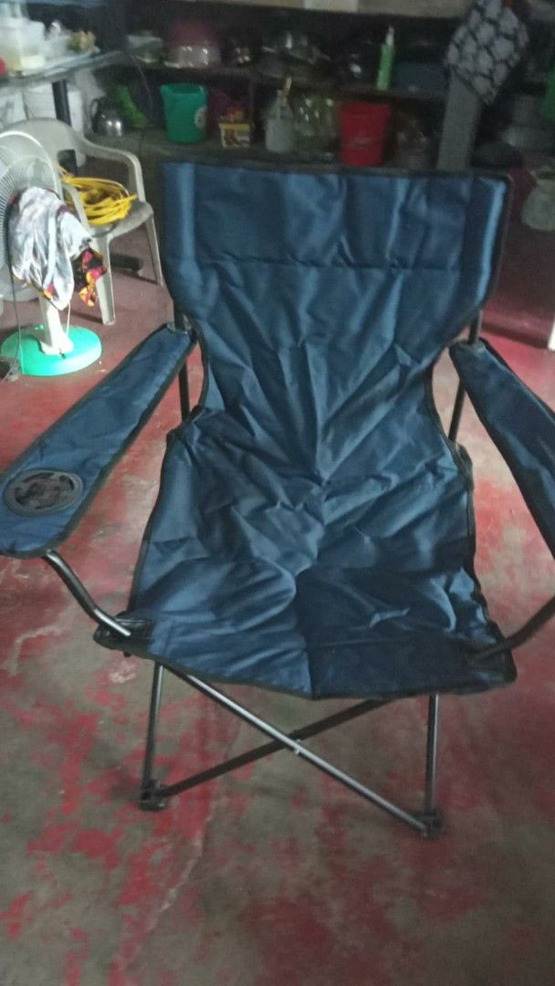Blue Folding Camping Chair with Armrests (Category: Hiking & Camping) located in Manila. Submitted by wisegem-231b (Listing ID 1470419845, Image 1). Description: - Color: Navy blue - Sturdy metal frame with cross supports for extra stability - Features a built-in cup holder on the right armrest - High backrest design for maximum comfort - Folds up compactly for easy transport and storage - Clean and intact fabric - Ideal for camping, backyard use
