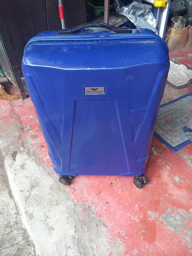 Blue Hard Shell Travel Luggage Suitcase (Category: Luggage) located in Manila. Submitted by wisegem-231b (Listing ID 1470392295, Image 3). Description: - Vibrant bright blue hard shell exterior for maximum durability and style - 4 smooth-rolling spinner wheels for effortless 360-degree mobility - Convenient retractable top handle and sturdy side carry handle - Secure zip-around closure to keep belongings safe during transit - Spacious interior fe