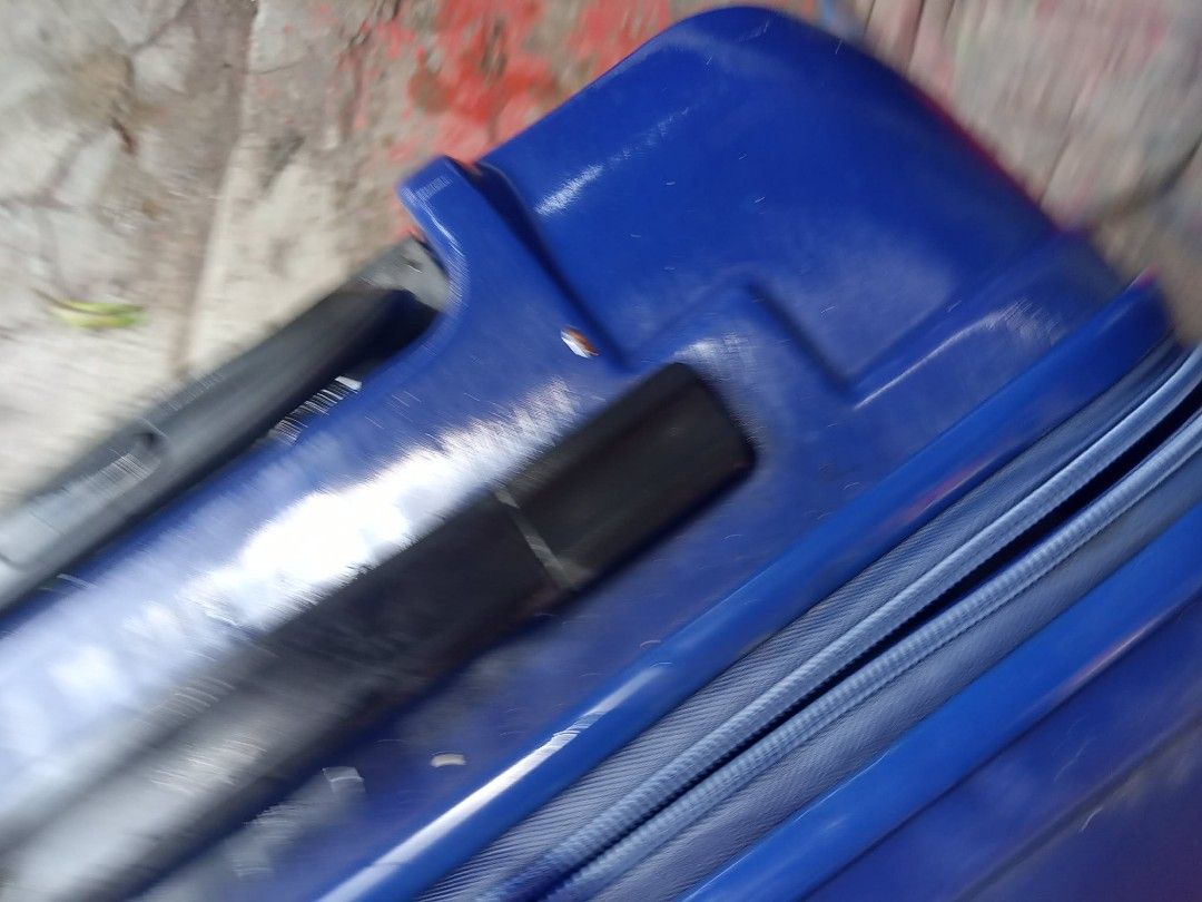 Blue Hard Shell Travel Luggage Suitcase (Category: Luggage) located in Manila. Submitted by wisegem-231b (Listing ID 1470392295, Image 1). Description: - Vibrant bright blue hard shell exterior for maximum durability and style - 4 smooth-rolling spinner wheels for effortless 360-degree mobility - Convenient retractable top handle and sturdy side carry handle - Secure zip-around closure to keep belongings safe during transit - Spacious interior fe
