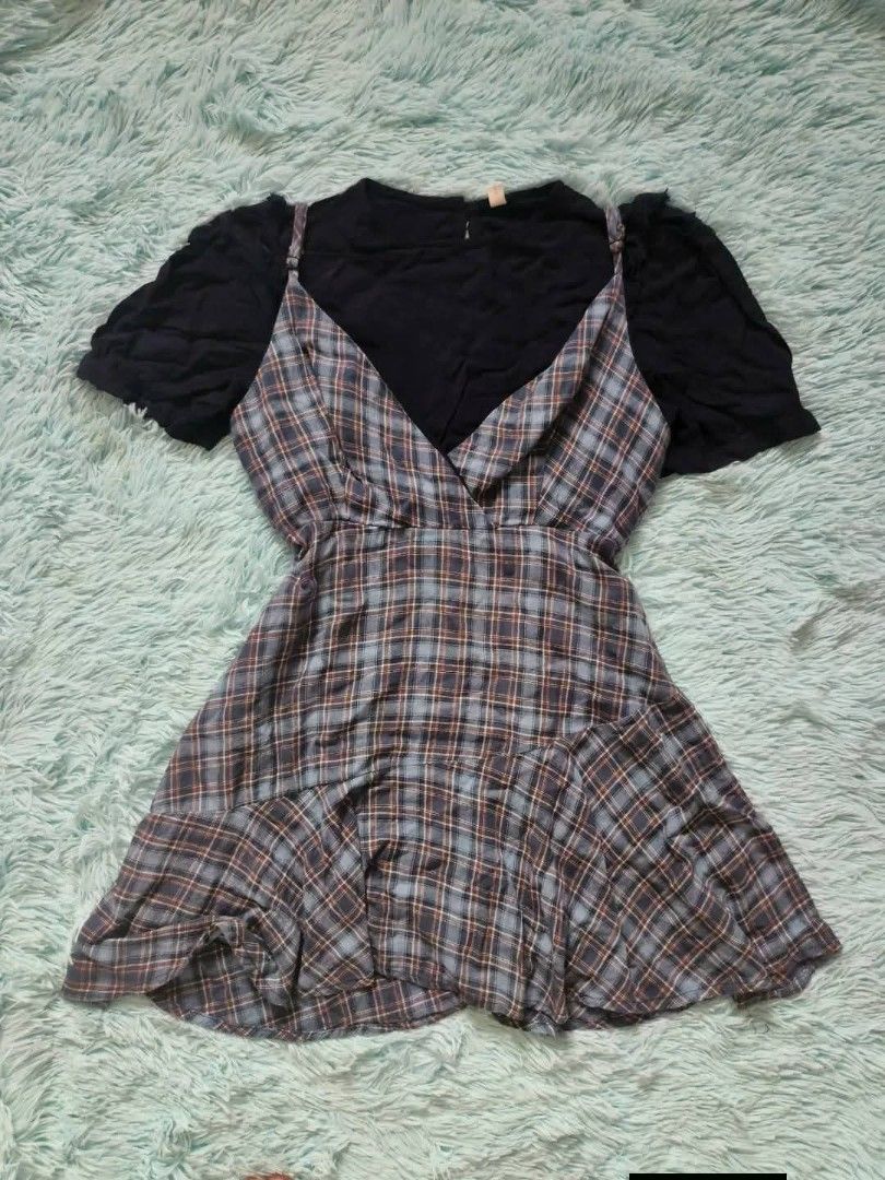Blue Plaid Dress (Category: Dresses) located in Quezon City. Submitted by alluring.avenue (Listing ID 1470548872, Image 1). Description: - Dress: Blue, gray plaid spaghetti strap mini dress - Design: V-neck cut with a cute ruffled hemline - Fit: Easy to throw on for an instant, effortless look - Occasion: Perfect casual streetwear for daily wear or day outs.
