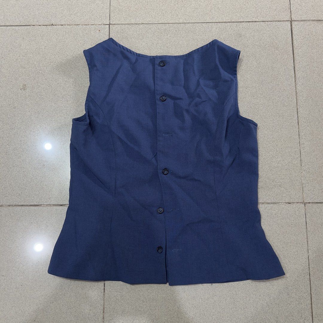 Blue sleeveless button-back tank top blouse (Category: Sleeveless) located in Quezon City. Submitted by outyougoph (Listing ID 1470362072, Image 2). Description: 1 missing button.