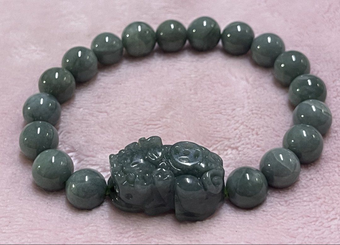Blue Water Jadeite with Pixiu Charm (Category: Bracelets) located in Manila. Submitted by Crystal_Oracle (Listing ID 1470423695, Image 1). Description: Blue water jadeite is a rare, highly valued Guatemala variety prized for its tranquil, light blue-to-greenish, lake-like appearance and superior translucency. It acts as a powerful, calming talisman, enhancing emotional balance, reducing stress, promoting clear communication, and offering spiritua