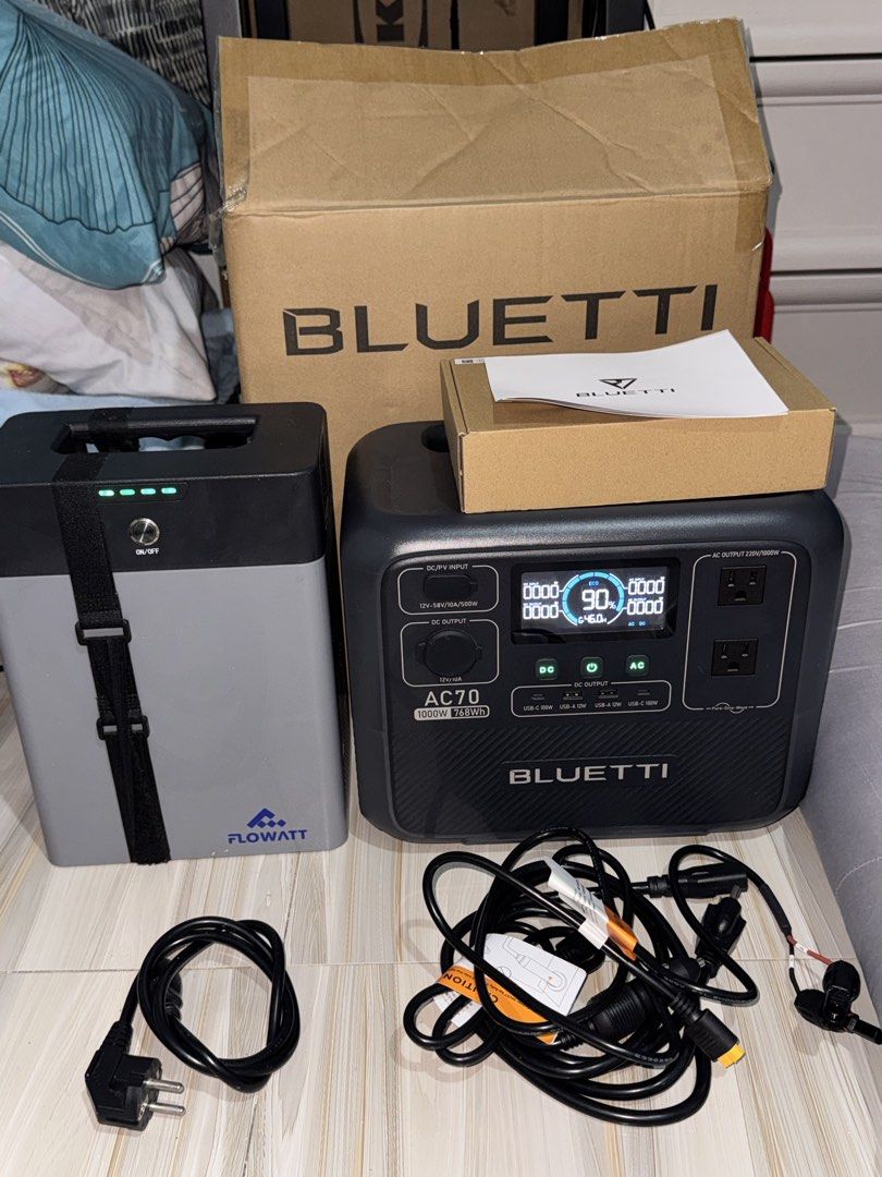 BLUETTI AND FLOWATT (Category: Batteries & Power Banks) located in Pasay City. Submitted by vonigop (Listing ID 1470370161, Image 3). Description: - Brand: BLUETTI (Model AC70: 1000W, 768Wh) and FLOWATT - Inclusions: Complete with original boxes, user manual, power cords, and charging cables as pictured - Features: Clear digital display, multiple AC/DC and USB-C output ports, highly reliable for brownouts and outdoor activities - Meetup Location: