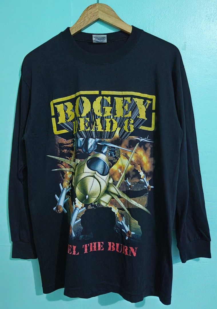Bogey Dead 6 (Category: Coats, Jackets and Outerwear) located in Taguig. Submitted by thriftedminds (Listing ID 1470518312, Image 1). Description: Item: Bogey Dead 6 (Reminiscent of Megadeth's Warheads on Foreheads or Wake Up Dead)🔥 ‎Size: Triple A (Artshirt Apparel & Activewear) ‎Width: 21 ‎Length: 28 ‎Condition: Excellent DM to purchase 📩.