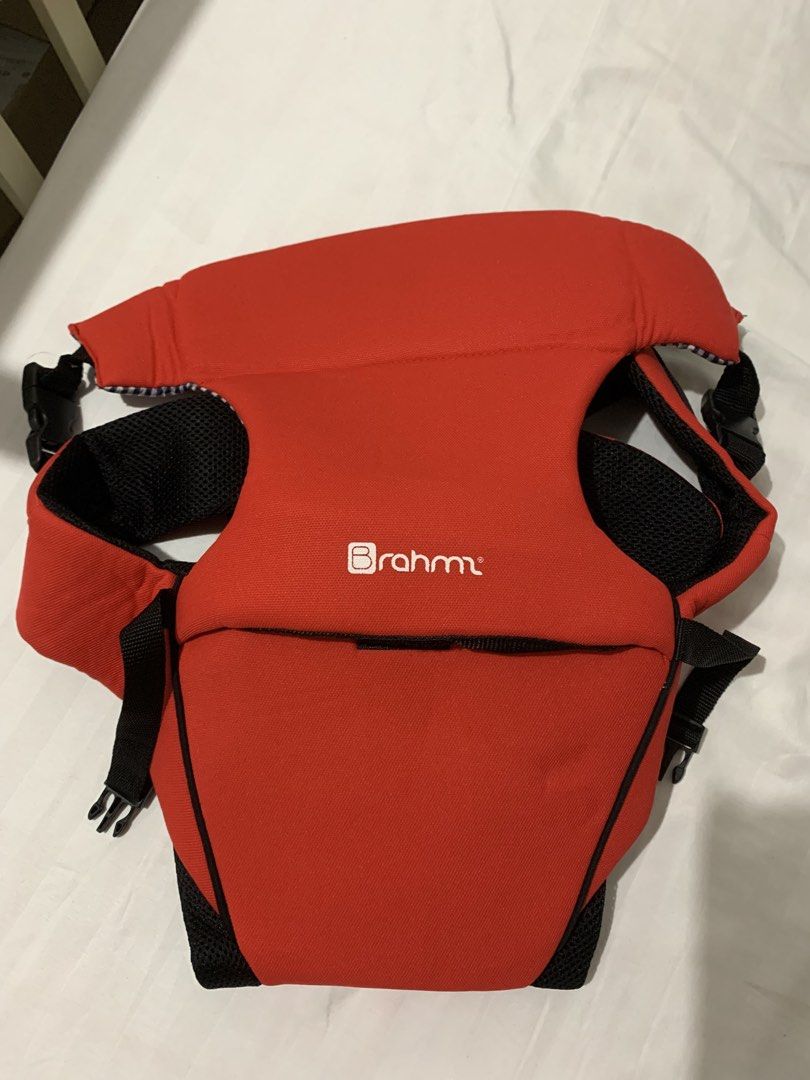Brahm Baby Carrier Red and Black (Category: Carriers & Slings) located in Antipolo. Submitted by franc09 (Listing ID 1470383334, Image 1). Description: - Brand: Brahm Baby Carrier - Color: Red and black with blue and white gingham check head support flap - Comfort: Breathable mesh panels inside for extra ventilation - Fit & Safety: Fully adjustable straps and secure plastic buckles - Condition: Brand new without tag. RFS: Gift kay baby nung baby 