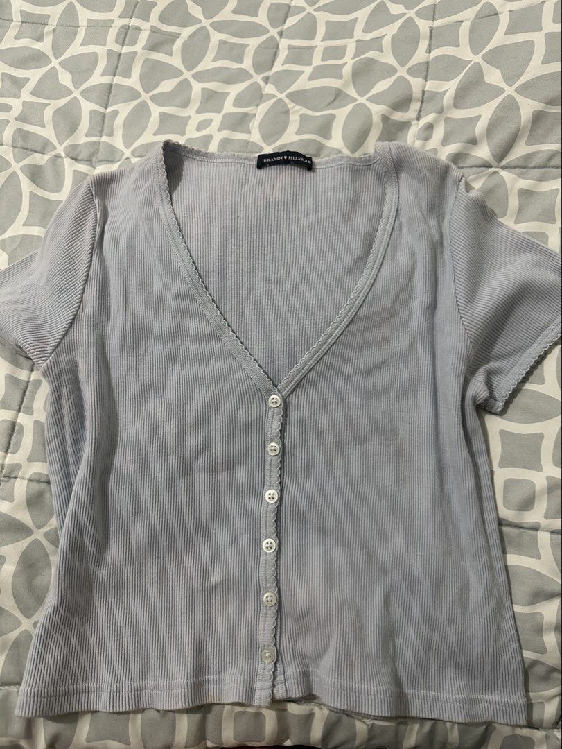 Brandy Melville Tops Set (Category: Shirts) located in Manila. Submitted by alexamnl (Listing ID 1470428511, Image 2). Description: WHITE TANK TOP does not have a tag. Also has a faint blue stain in the back area. Fits S-M. .