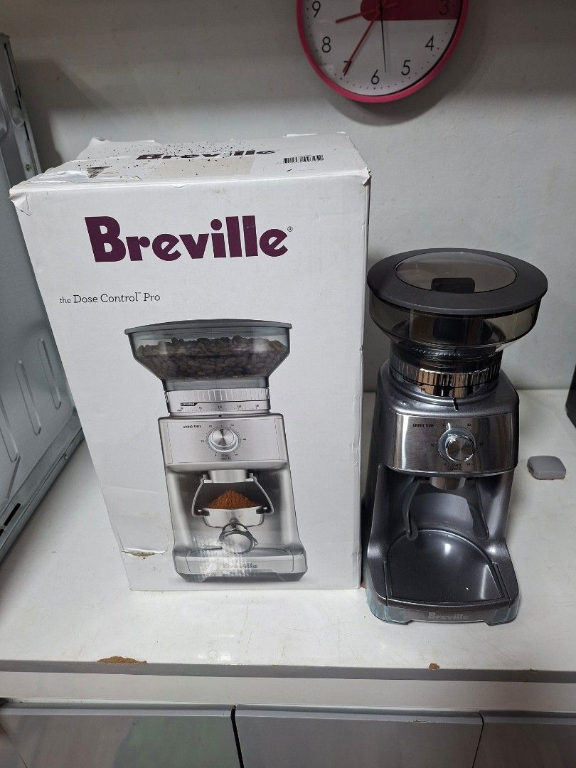 Breville The Dose Control Pro Coffee Grinder BCG600 (Category: Coffee Machines & Makers) located in Taguig. Submitted by gongolly2007 (Listing ID 1470493269, Image 1). Description: - Model: Breville The Dose Control Pro Coffee Grinder - Color: Gunmetal Grey - Features: Adjustable front grind time dial, stainless steel conical burrs, and clear bean hopper - Condition: Powers on and works normally - Inclusions: Original box included - Power: Standa