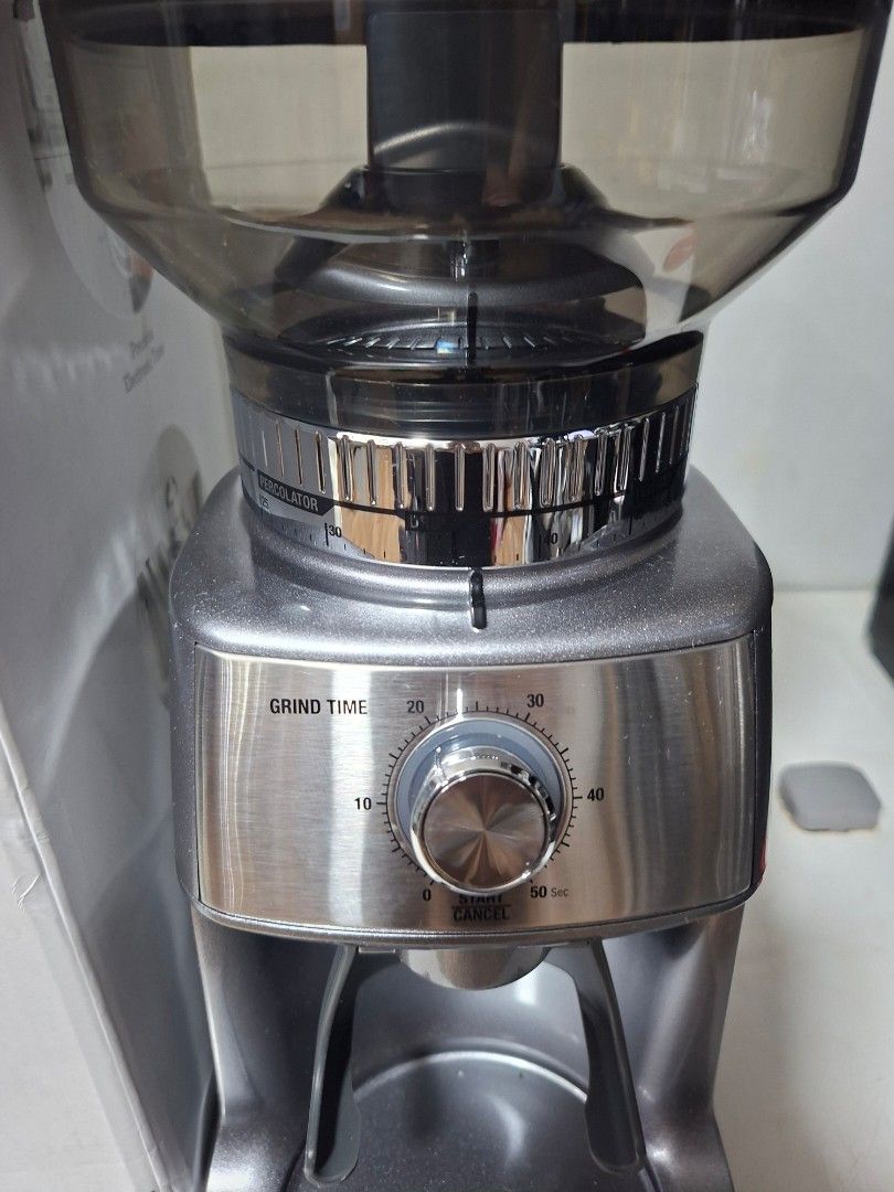 Breville The Dose Control Pro Coffee Grinder BCG600 (Category: Coffee Machines & Makers) located in Taguig. Submitted by gongolly2007 (Listing ID 1470493269, Image 2). Description: - Model: Breville The Dose Control Pro Coffee Grinder - Color: Gunmetal Grey - Features: Adjustable front grind time dial, stainless steel conical burrs, and clear bean hopper - Condition: Powers on and works normally - Inclusions: Original box included - Power: Standa