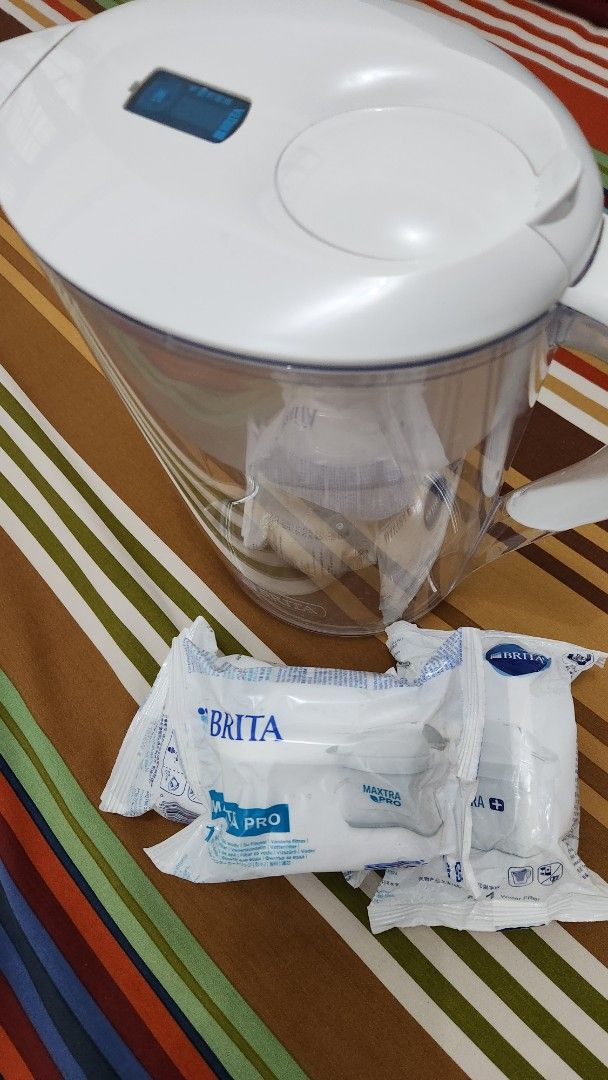 Brita Water Filter Pitcher with Maxtra Pro Cartridges (Category: Pitchers & Dispensers) located in Manila. Submitted by happybear_77e59e777 (Listing ID 1470510997, Image 1). Description: - White Brita water pitcher featuring a convenient digital display on the lid - Bundle includes 3 unopened packs of Brita Maxtra Pro replacement cartridges - Transparent jug body allows you to check water levels instantly at a glance - Clean setup, hygienic, and 