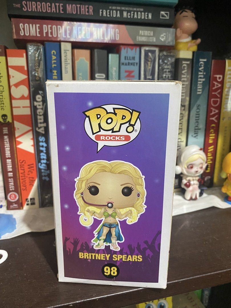 Britney Spears Funko I’m A Slave 4 U (Category: Designer & Blind Box Toys) located in Caloocan City. Submitted by g4bbygabby (Listing ID 1470438205, Image 2). Description: RFS Decluttering. No damage or issue - Item: Britney Spears Funko Pop! Rocks #98 - Design: Iconic VMA performance outfit with yellow snake and microphone headset - Packaging: Original box with purple backdrop graphic included .