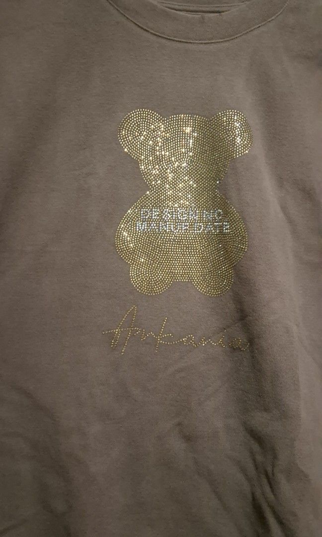 Brown Bear Rhinestones Shirt (Category: Shirts) located in Bulacan. Submitted by rgrs.collexn (Listing ID 1470453733, Image 2). Description: HQ fabric. Makapal. 42-44" bust Flaw: nasa last pic po. ✨ Check out my listings for more affordable preloved finds! ✨ Please manage your expectations as all items are preloved. Any flaw/s, if applicable, will be clearly indicated in the item description. ‼️ No joy reservers or bogus buyers. ‼️ Clicking "Offe