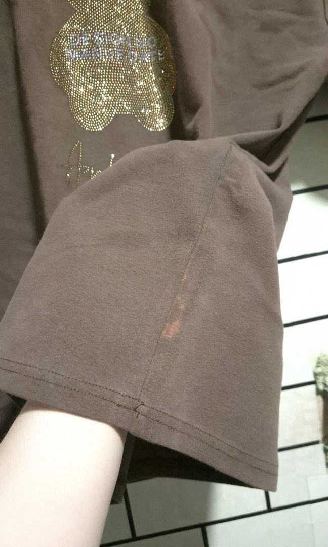 Brown Bear Rhinestones Shirt (Category: Shirts) located in Bulacan. Submitted by rgrs.collexn (Listing ID 1470453733, Image 3). Description: HQ fabric. Makapal. 42-44" bust Flaw: nasa last pic po. ✨ Check out my listings for more affordable preloved finds! ✨ Please manage your expectations as all items are preloved. Any flaw/s, if applicable, will be clearly indicated in the item description. ‼️ No joy reservers or bogus buyers. ‼️ Clicking "Offe