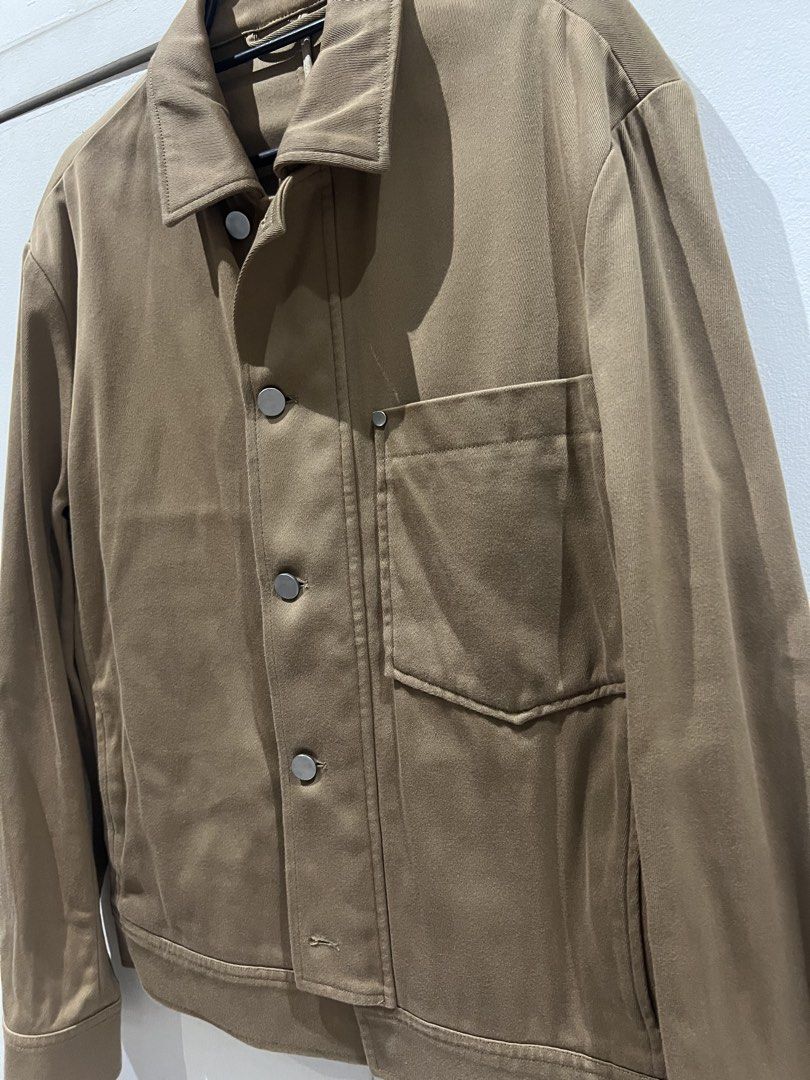 COS Brown Button-Up Casual Jacket with Chest Pocket (Category: Coats, Jackets and Outerwear) located in Quezon City. Submitted by Zandee (Listing ID 1470485916, Image 2). Description: - Brown casual jacket made from durable heavy twill fabric. UNISEX - Silver snap button closure down the front and on cuffs - Single chest pocket accented with rivet detail - Clean collar and structured hem for a polished look - Versatile earth tone, perfect for eas