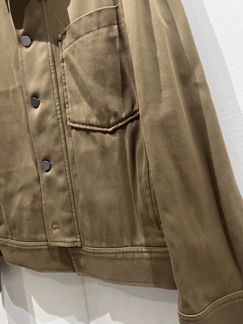 COS Brown Button-Up Casual Jacket with Chest Pocket (Category: Coats, Jackets and Outerwear) located in Quezon City. Submitted by Zandee (Listing ID 1470485916, Image 3). Description: - Brown casual jacket made from durable heavy twill fabric. UNISEX - Silver snap button closure down the front and on cuffs - Single chest pocket accented with rivet detail - Clean collar and structured hem for a polished look - Versatile earth tone, perfect for eas