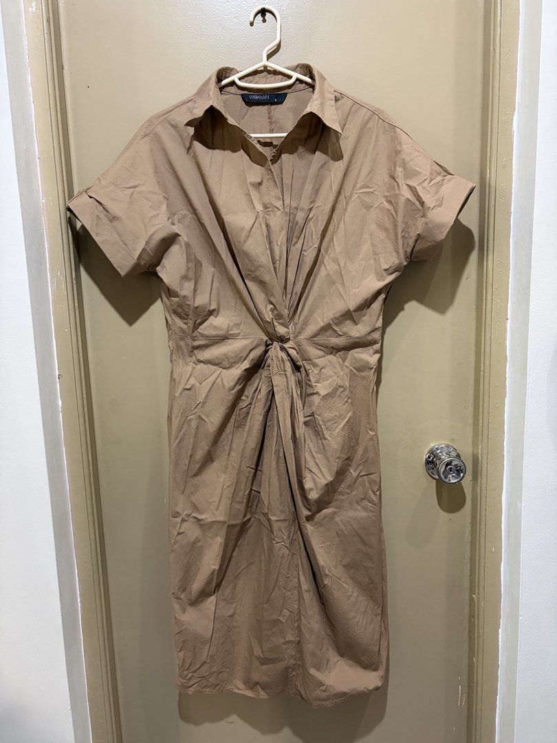 Brown Dress Midi Size (Category: Dresses) located in San Pedro. Submitted by iarruh (Listing ID 1470396224, Image 1). Description: - SM Woman dress - Color: Solid tan/brown - Detail: Chic twisted knot at the front waist - Condition: Great everyday casual wear, needs a quick steam iron - Great condition, used once only.