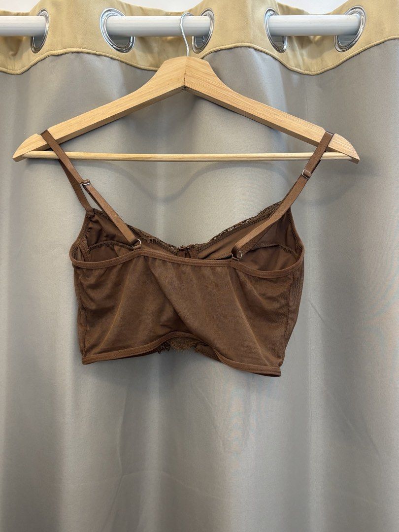 Brown Lace Trim Corset Crop Top (Category: Sleeveless) located in Manila. Submitted by perwinkle.ph (Listing ID 1470435545, Image 2). Description: - sheer mesh and detailed floral lace on cups and front - adjustable shoulder straps - used once.
