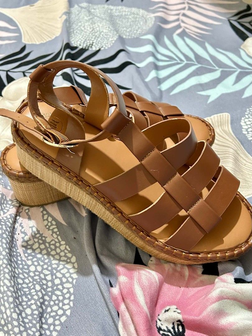 Brown Platform Gladiator Sandals (Category: Sandals) located in Quezon City. Submitted by yyyahhhhhh (Listing ID 1470445521, Image 2). Description: - Style: Brown platform sandals with a comfortable wide-fit design - Details: Multiple top straps and an adjustable ankle strap with gold-toned hardware - Size: EU 44-45 / UK 11 / US 13.