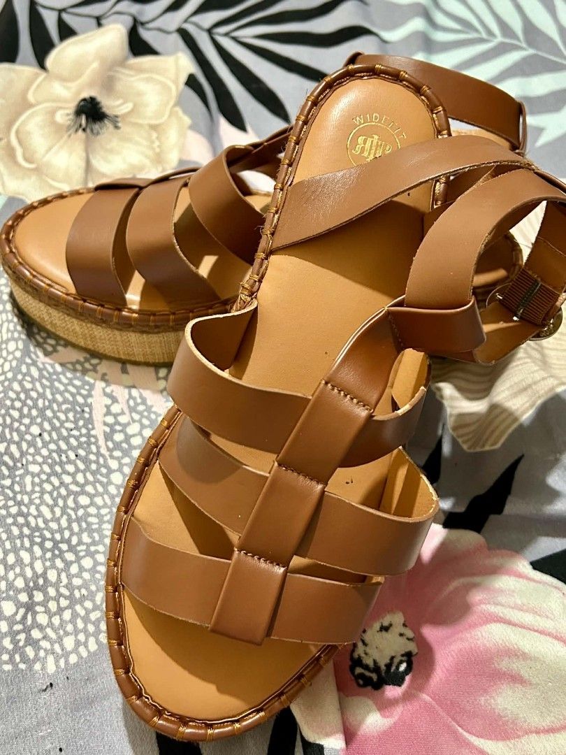 Brown Platform Gladiator Sandals (Category: Sandals) located in Quezon City. Submitted by yyyahhhhhh (Listing ID 1470445521, Image 3). Description: - Style: Brown platform sandals with a comfortable wide-fit design - Details: Multiple top straps and an adjustable ankle strap with gold-toned hardware - Size: EU 44-45 / UK 11 / US 13.