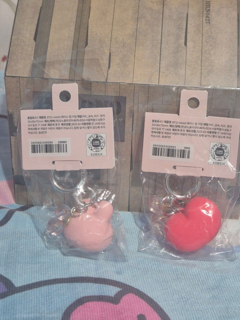 BT21 Face Cap Keyring Tata Cooky (Category: Character Goods) located in Makati City. Submitted by neri_11 (Listing ID 1470443530, Image 2). Description: - Official Line Friends merchandise - Characters: Tata & Cooky (BT21) - Features an adorable cherry charm - Material: Durable PVC and metal - Condition: Brand new, unopened in original packaging with tag. Php 780 for both. Php 400 each. .