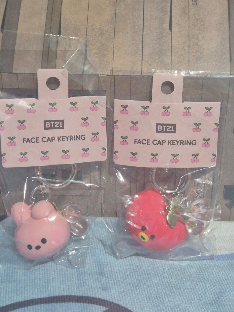 BT21 Face Cap Keyring Tata Cooky (Category: Character Goods) located in Makati City. Submitted by neri_11 (Listing ID 1470443530, Image 1). Description: - Official Line Friends merchandise - Characters: Tata & Cooky (BT21) - Features an adorable cherry charm - Material: Durable PVC and metal - Condition: Brand new, unopened in original packaging with tag. Php 780 for both. Php 400 each. .
