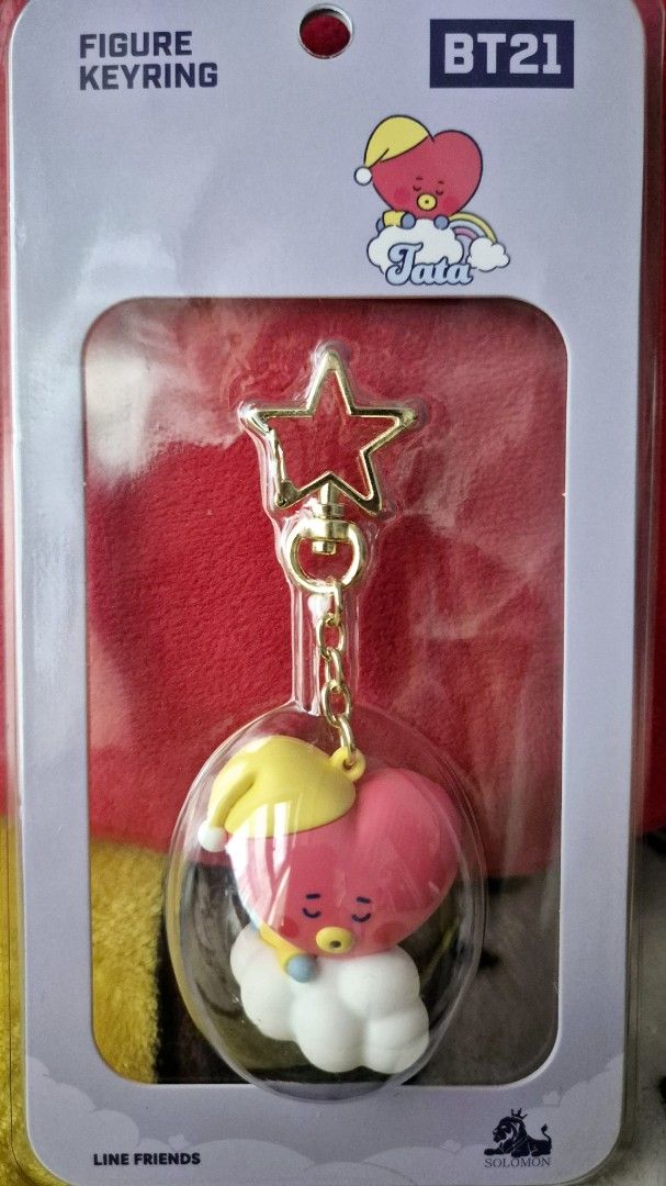 BT21 Tata Figure Keyring LINE FRIENDS (Category: Character Goods) located in Makati City. Submitted by neri_11 (Listing ID 1470449164, Image 1). Description: - Official Line Friends BT21 Tata figure keyring - Design: Tata in a yellow sleeping hat resting on a cloud inside a clear capsule - Hardware: Premium gold star clasp and chain - Condition: Brand new, stored in original unopened retail packaging - 100% authentic and ready to ship.