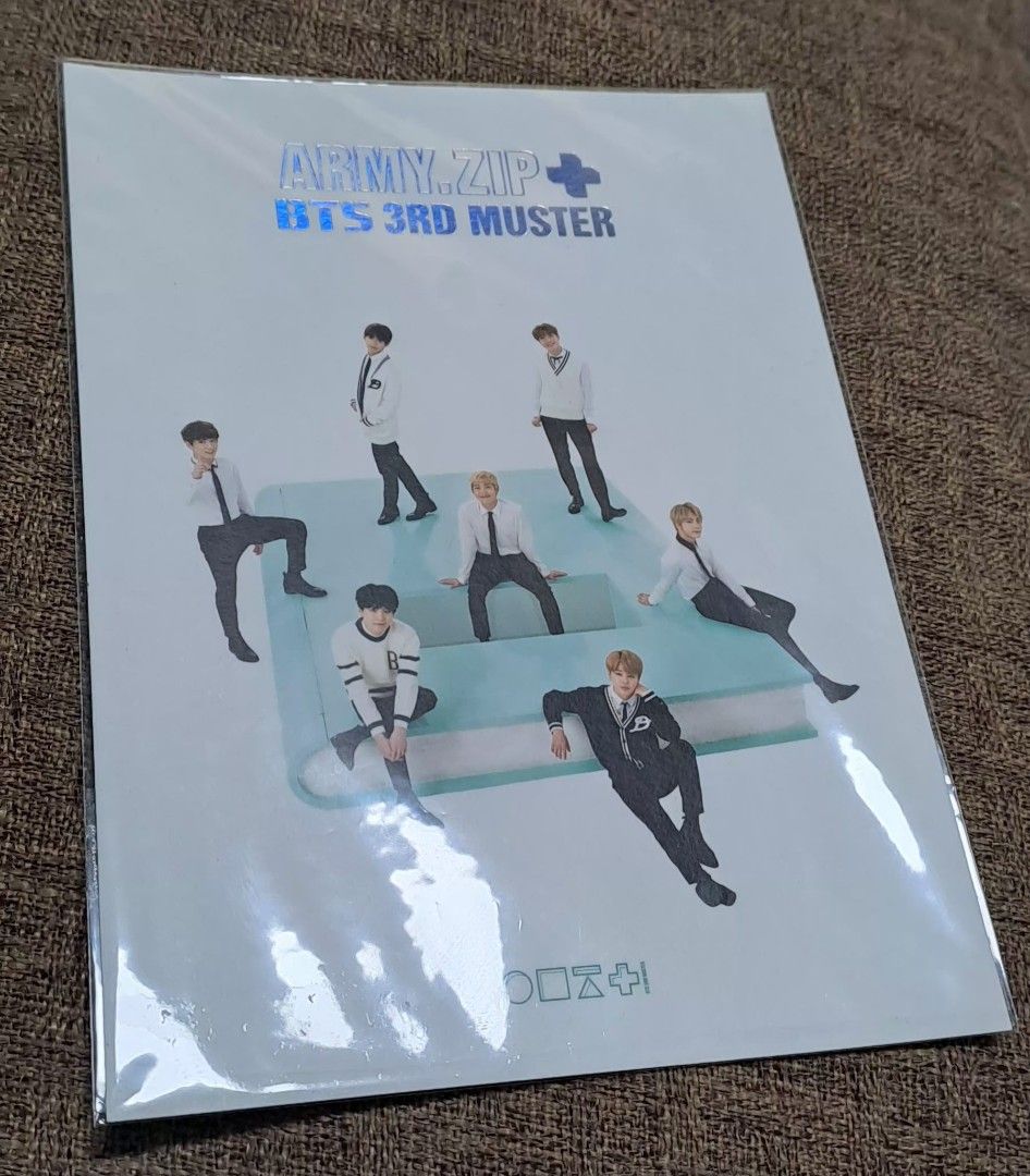 BTS 3rd Muster army.zip+ Official Poster (Category: K-Wave Merchandise) located in Manila. Submitted by yatzyubz (Listing ID 1470414646, Image 1). Description: - Official BTS 3rd Muster ARMY.ZIP+ poster - Features all 7 members on a giant book graphic with holographic text - Condition: Excellent, stored safely in a plastic sleeve - Clean edges, no pinholes, no tape marks - Perfect addition to any K-pop collection.