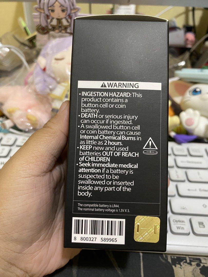 BTS Official Light Stick Keyring Ver.4 (Category: K-Wave Merchandise) located in Imus. Submitted by mnmv23 (Listing ID 1470532167, Image 2). Description: Official BTS light stick keyring version 4 by Big Hit Music and Hybe. Black box packaging with Army logo detailing. Requires LR44 button cell batteries, nominal voltage 1.5V x 3. Manufactured in South Korea. Compact size measuring 5 x 11.98cm..