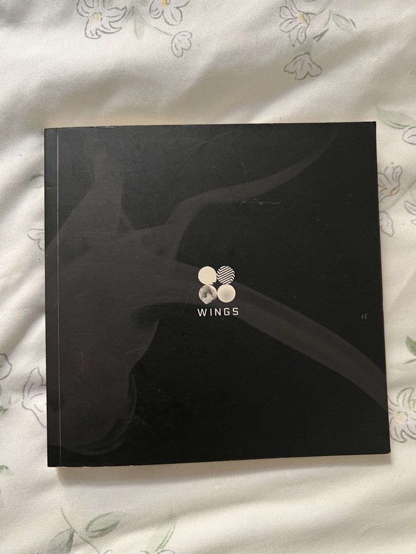 BTS WINGS Album (Unsealed) (Category: CDs & DVDs) located in Makati City. Submitted by _euphoriayn (Listing ID 1470556746, Image 1). Description: - Item: BTS Wings Album (2nd Studio Album) - Release Year: 2016 - Design: Black cover with official BTS logo - Inclusions: CD (intact in sleeve), Photobook, and Tracklist on back cover - Condition: Well-maintained and ready for shipping - Mode of Payment: GCash, Maribank, or Maya RFS: Decluttering .