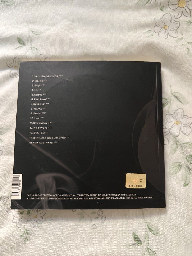 BTS WINGS Album (Unsealed) (Category: CDs & DVDs) located in Makati City. Submitted by _euphoriayn (Listing ID 1470556746, Image 2). Description: - Item: BTS Wings Album (2nd Studio Album) - Release Year: 2016 - Design: Black cover with official BTS logo - Inclusions: CD (intact in sleeve), Photobook, and Tracklist on back cover - Condition: Well-maintained and ready for shipping - Mode of Payment: GCash, Maribank, or Maya RFS: Decluttering .