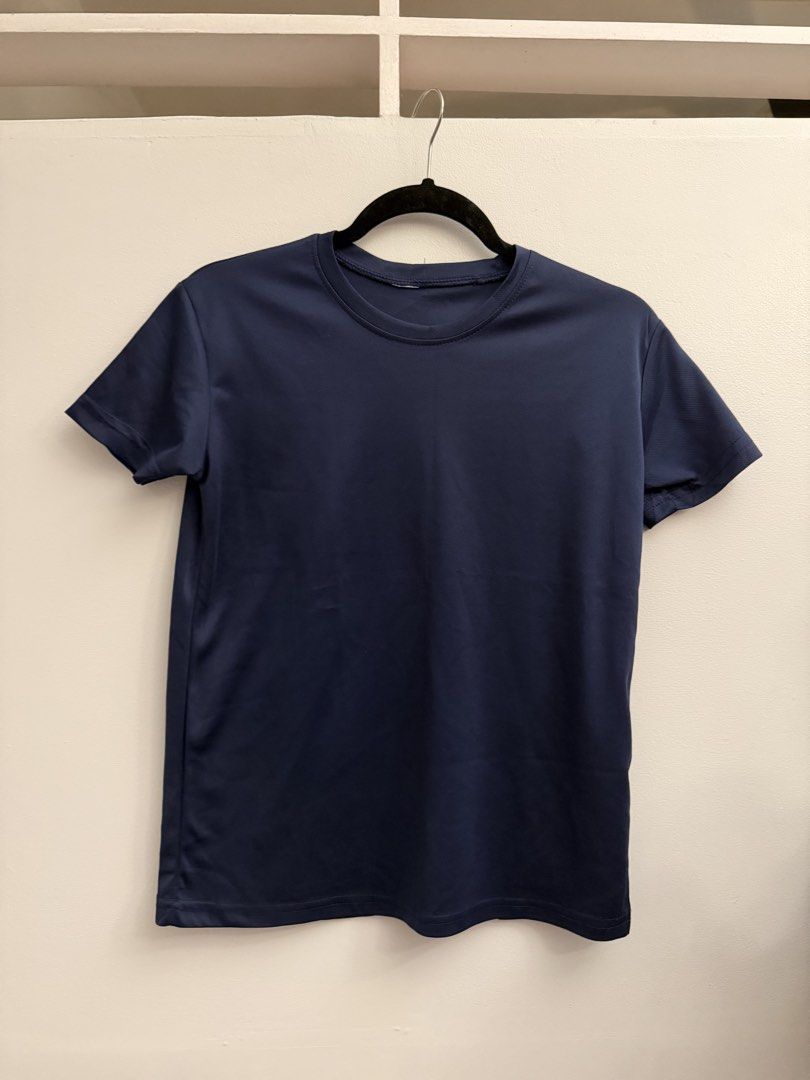 BUNDLE of 3 Dry fit Regular fitting Shirts small (Category: Activewear) located in Manila. Submitted by closetclearout.mnl (Listing ID 1470392777, Image 2). Description: colors: white, navy blue and black size: small (tight fit on medium) great for working out breathable .