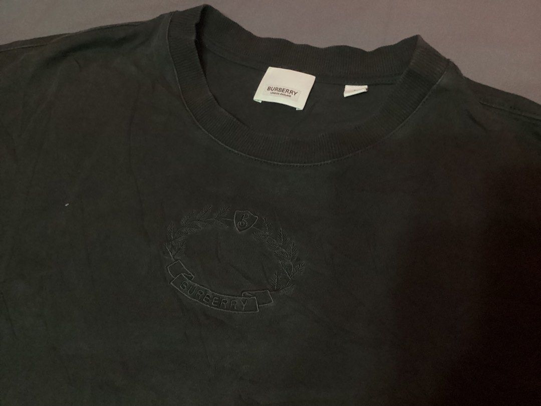 Burberry Black T-shirt (Category: Tshirts & Polo Shirts ) located in Davao. Submitted by ferdipt (Listing ID 1470369874, Image 3). Description: Excellent Condition Made in Italy Size L L:27 inches Armpit to Armpit:23 inches 100% Cotton.