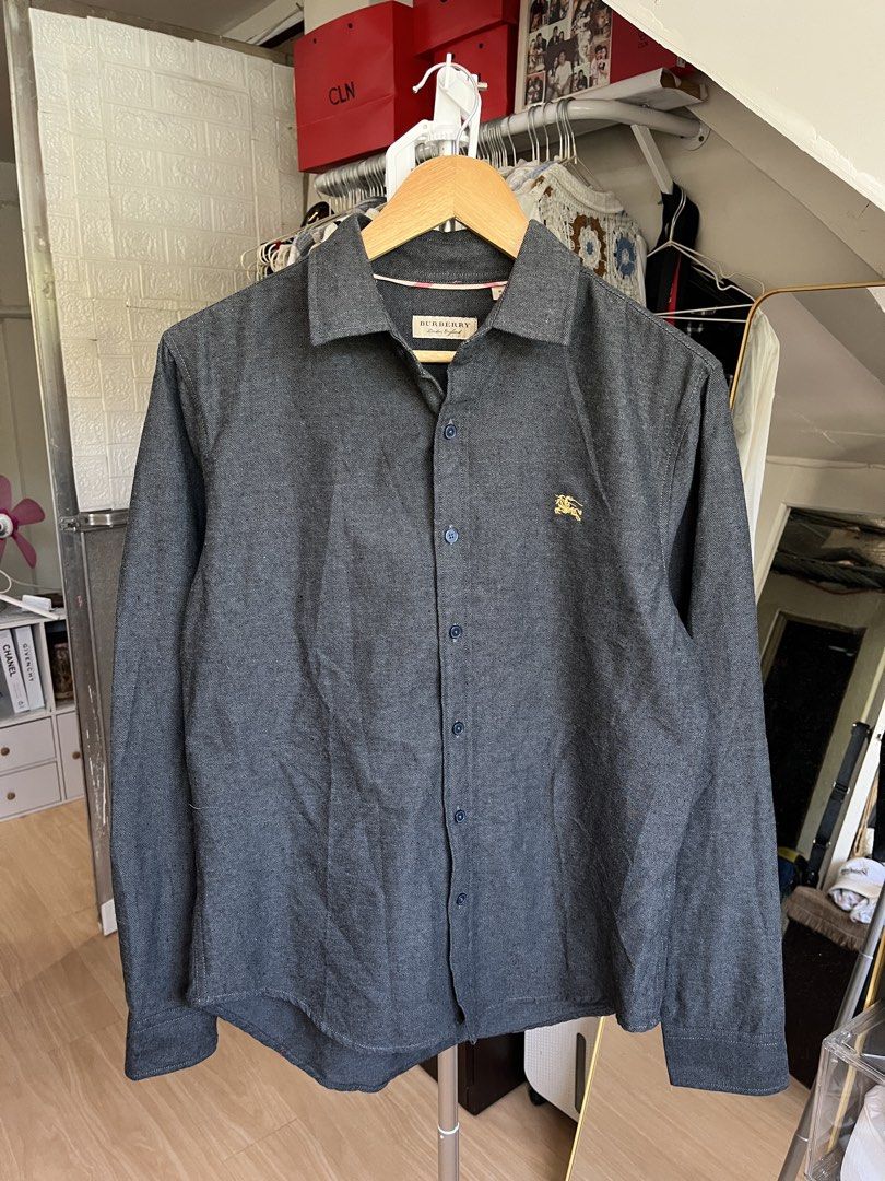 Burberry (Button down) longsleeve (Category: Luxury Apparel) located in Tayug. Submitted by thriftyshady_ (Listing ID 1470364673, Image 1). Description: Burberry longsleeve (Button down) XL on tag 21x27.5 Dimes No issue 10/10 Condition and color rate As new condition.