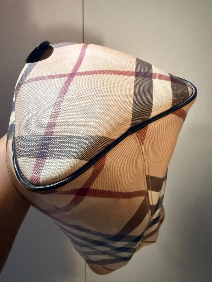 Burberry Check Boston Bag (Category: Luxury Bags & Wallets) located in Manila. Submitted by _outofthecloset. (Listing ID 1470394356, Image 2). Description: - Brand: Burberry - Pattern: Classic Check on Canvas - Trim: Black patent leather with dual top handles - Closure: Secure top zip with metal hardware - Interior: Fabric-lined with a zippered pocket and authentic Burberry leather tag - Condition: Some visible wear on the handles, the body and m