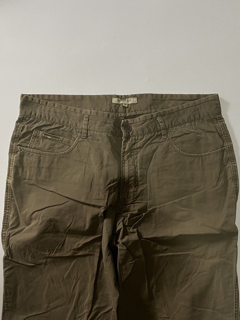 Burberry Khaki Chino Trousers (Category: Chinos) located in Manila. Submitted by finofindthisart (Listing ID 1470533454, Image 3). Description: Length 40 Width 34 Hem 8 Measured it by inches Issue: N/A This is a pre-loved/thrifted items and may show minor signs of issue due to its vintage nature. Kindly manage expectations. No refunds or exchanges will be accepted. 📍Pasay City DM for inquiries..
