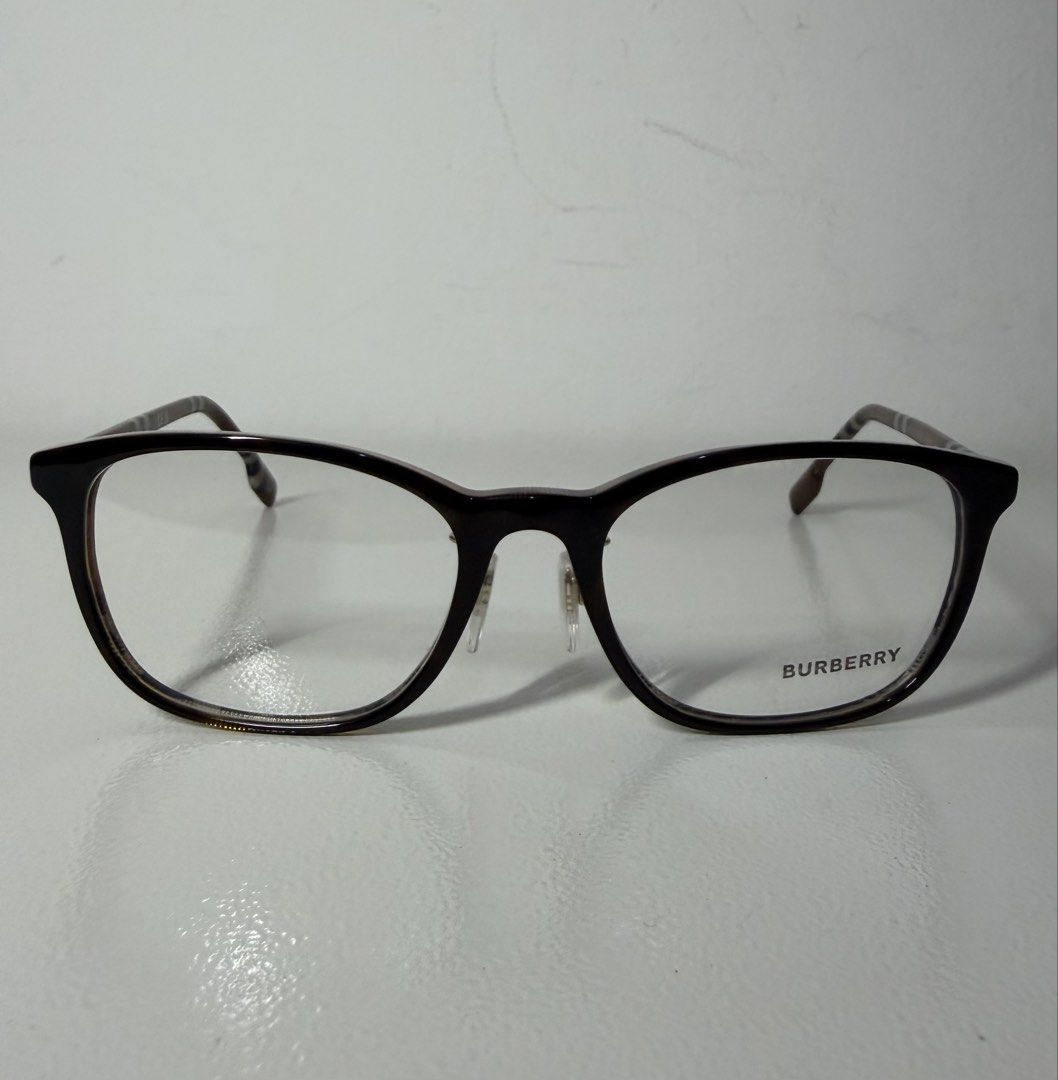Burberry Prescription Eyeglasses (Category: Sunglasses & Eyewear) located in Manila. Submitted by importgoodiesph (Listing ID 1470483467, Image 2). Description: Burberry B2371-D Brown Burberry Pattern Frame Eyeglasses - in excellent unused condition - unisex - dimensions: 53-18-140 - material: acetate - made in Italy - comes with box, leather case, authenticity certificate, cleaning cloth, Luxottica card LBC shipping c/o buyer..