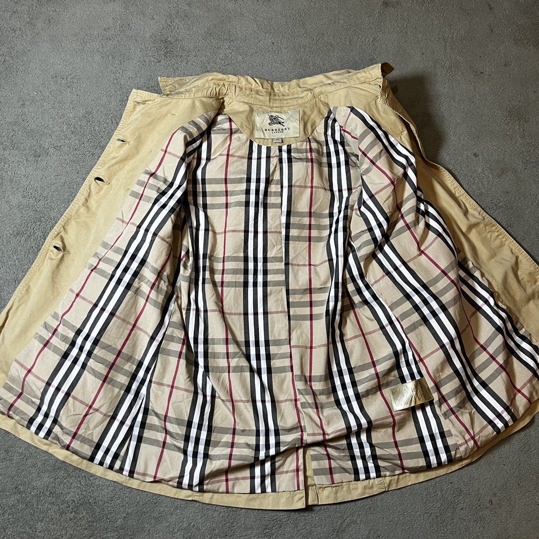 BURBERRY Short Trench Coat (Category: Luxury Apparel) located in Ajuy. Submitted by pastforward_womens (Listing ID 1470548421, Image 2). Description: AUTHENTIC Excellent Condition Can fit Small to Medium 19x26.