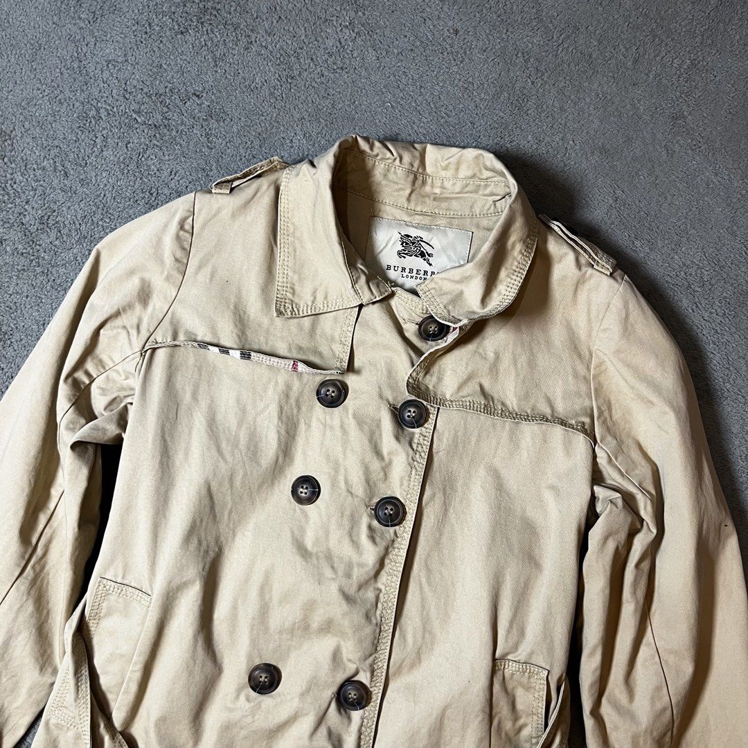 BURBERRY Short Trench Coat (Category: Luxury Apparel) located in Ajuy. Submitted by pastforward_womens (Listing ID 1470548421, Image 3). Description: AUTHENTIC Excellent Condition Can fit Small to Medium 19x26.