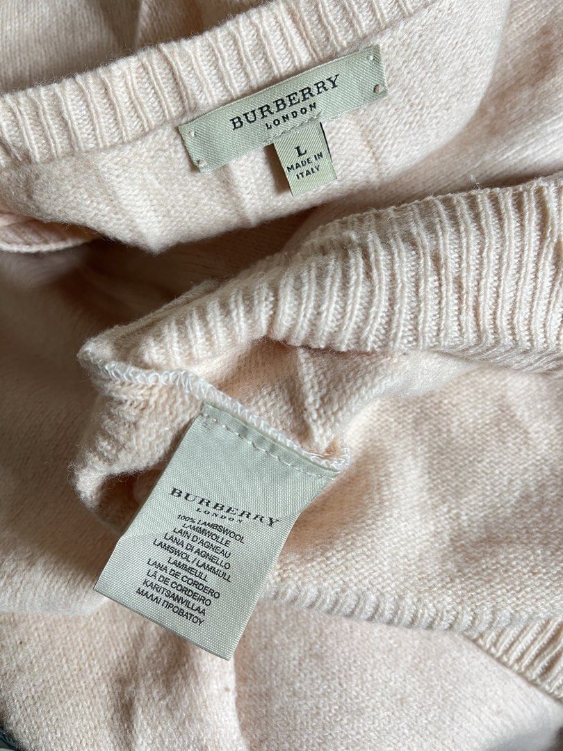 Burberry Vneck Knit Sweater (Category: Coats, Jackets and Outerwear) located in Pagadian. Submitted by angelcanzado (Listing ID 1470356545, Image 2). Description: Burberry Vneck Knit Sweater Excellent Condition Complete Tags Embroidered Logo Prettyyy Large on Tag.