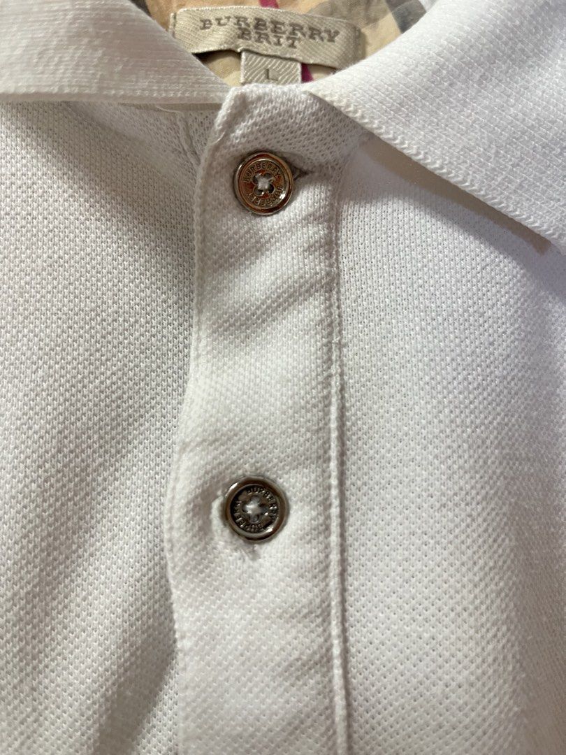 BURBERRY WHITE POLO SHIRT (Category: Tshirts & Polo Shirts ) located in Dumangas. Submitted by chiiieeef (Listing ID 1470471048, Image 2). Description: Dimension : 18x28.