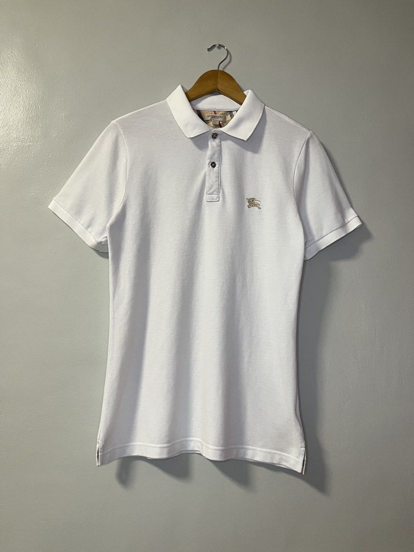 BURBERRY WHITE POLO SHIRT (Category: Tshirts & Polo Shirts ) located in Dumangas. Submitted by chiiieeef (Listing ID 1470471048, Image 1). Description: Dimension : 18x28.