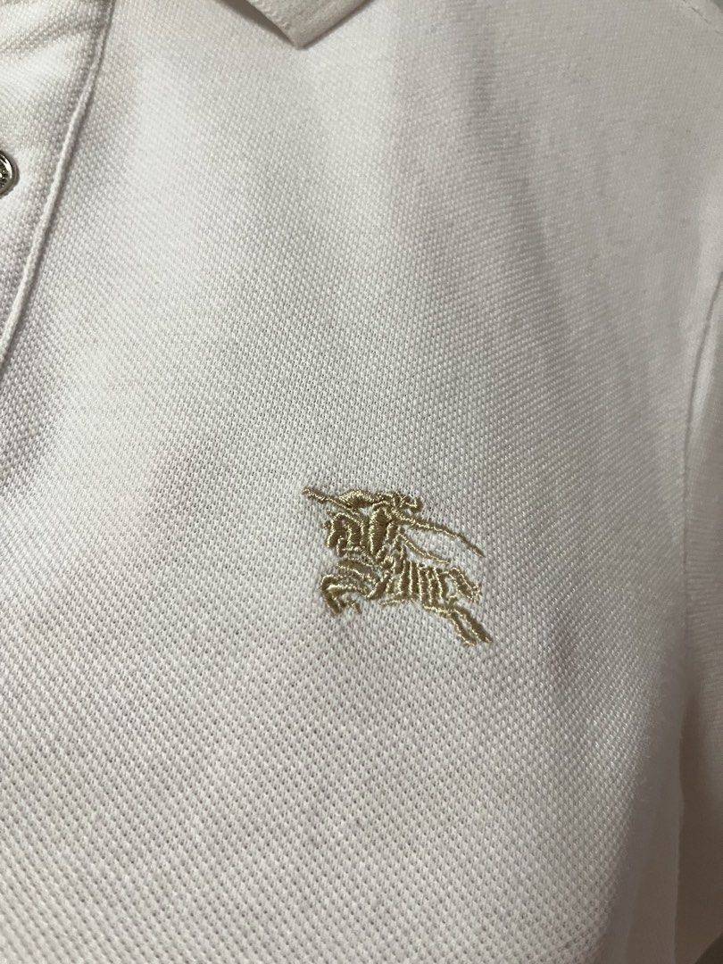 BURBERRY WHITE POLO SHIRT (Category: Tshirts & Polo Shirts ) located in Dumangas. Submitted by chiiieeef (Listing ID 1470471048, Image 3). Description: Dimension : 18x28.