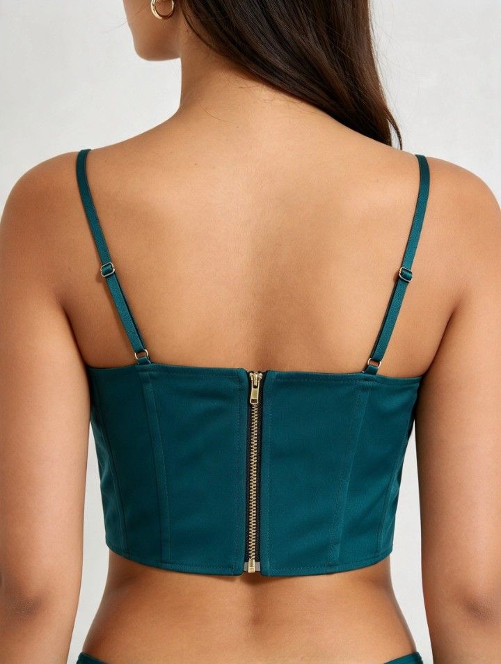 BUSTIER CORSET TOP (Category: Others Tops) located in Manila. Submitted by swiftgem.027998 (Listing ID 1470401994, Image 2). Description: BNEW WITH TAG BUSTIER CORSET TOP DARK TEAL/DARK BLUE GREEN ? 😅 SUPER RARE NG KULAY ANG GANDA DIN NG DESIGN WITH BONINGS ZIP BACK WITH UNDERWIRE BUST SIZE IS FOR 32-34 A/B ONLY NATATANGGAL UNG STRAP KAYA PWEDE MAGING TUBE MED SIZE NOT STRETCH 27INCHES WAIST SIZE ONLY.