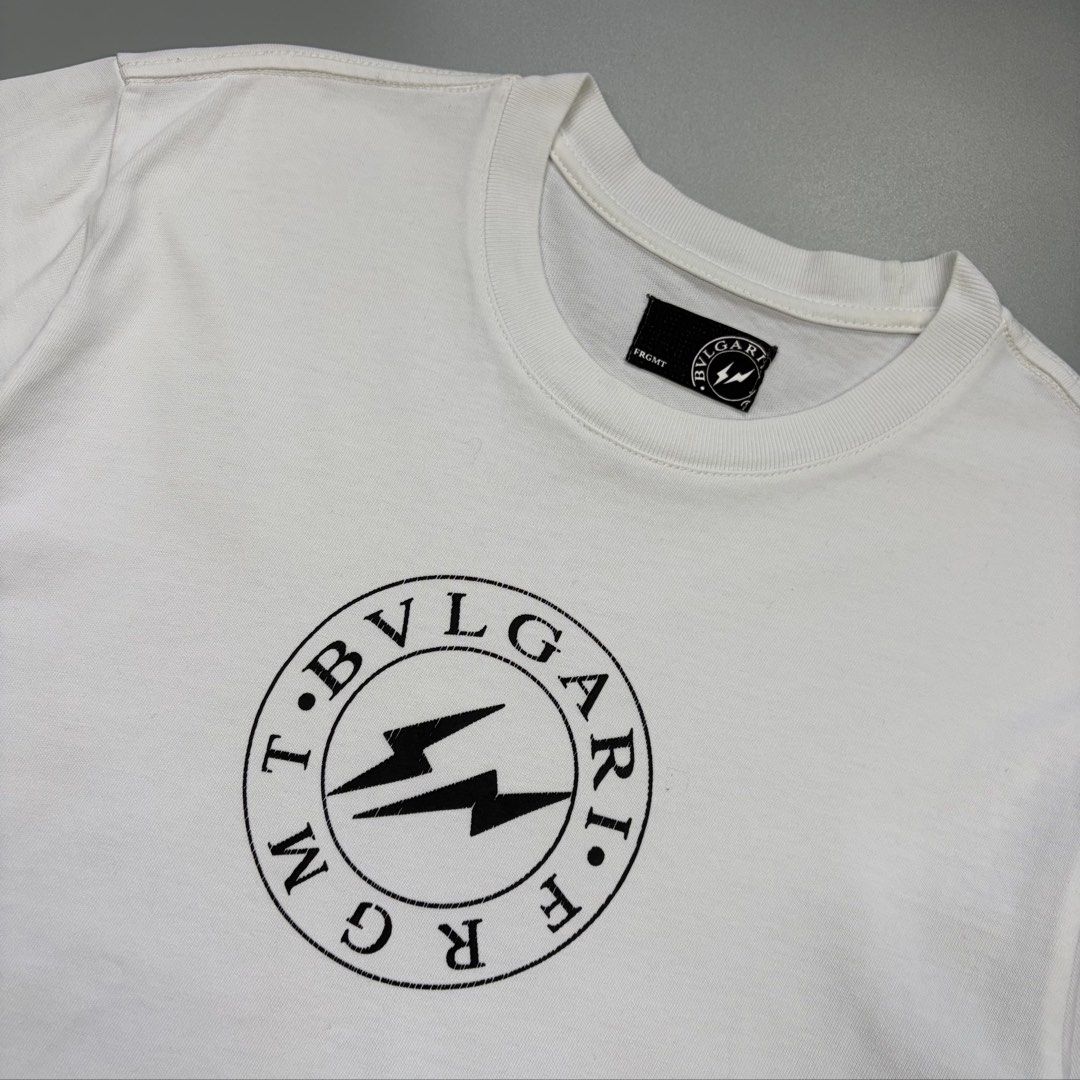 Bvlgari x Fragment (Authentic) (Category: Luxury Apparel) located in Cavite. Submitted by onebeancent (Listing ID 1470557235, Image 2). Description: Size: S to M (Men) | Large (Women's) Dimension: 19" Width | 26" Length Color: White Color Rate: 9.5/10 Issue: Hairline crack on print Condition: Excellent overall Price: 880php Additional Shipping Fee (J&T Small Pouch) 75php Luzon 100php visayas 120php mindanao.