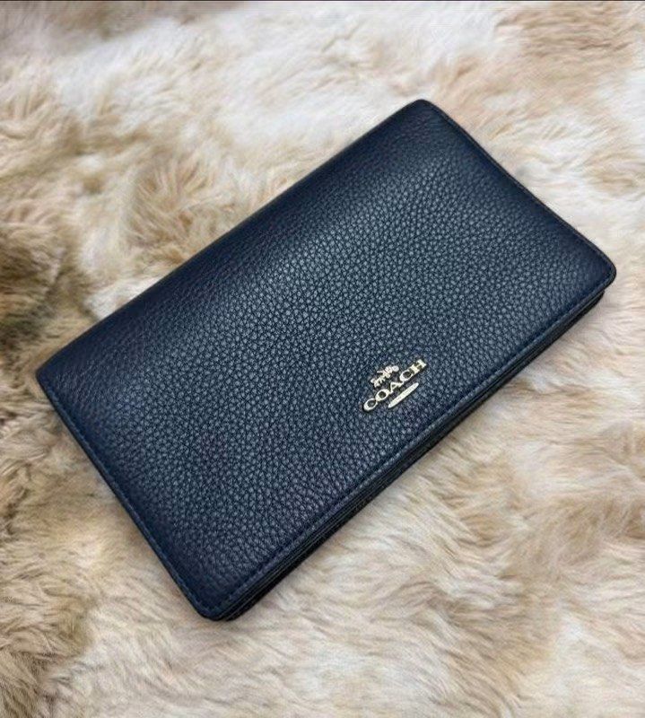C0ach Crossbody (Category: Purses & Pouches) located in Manila. Submitted by annafinds (Listing ID 1470384930, Image 2). Description: Authentic C0ach Crossbody in a black leather with gold-tone hardware and a detachable strap. - In excellent condition ₱7,999 Open for layaway..