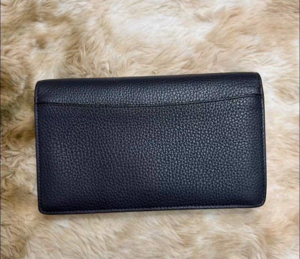 C0ach Crossbody (Category: Purses & Pouches) located in Manila. Submitted by annafinds (Listing ID 1470384930, Image 3). Description: Authentic C0ach Crossbody in a black leather with gold-tone hardware and a detachable strap. - In excellent condition ₱7,999 Open for layaway..
