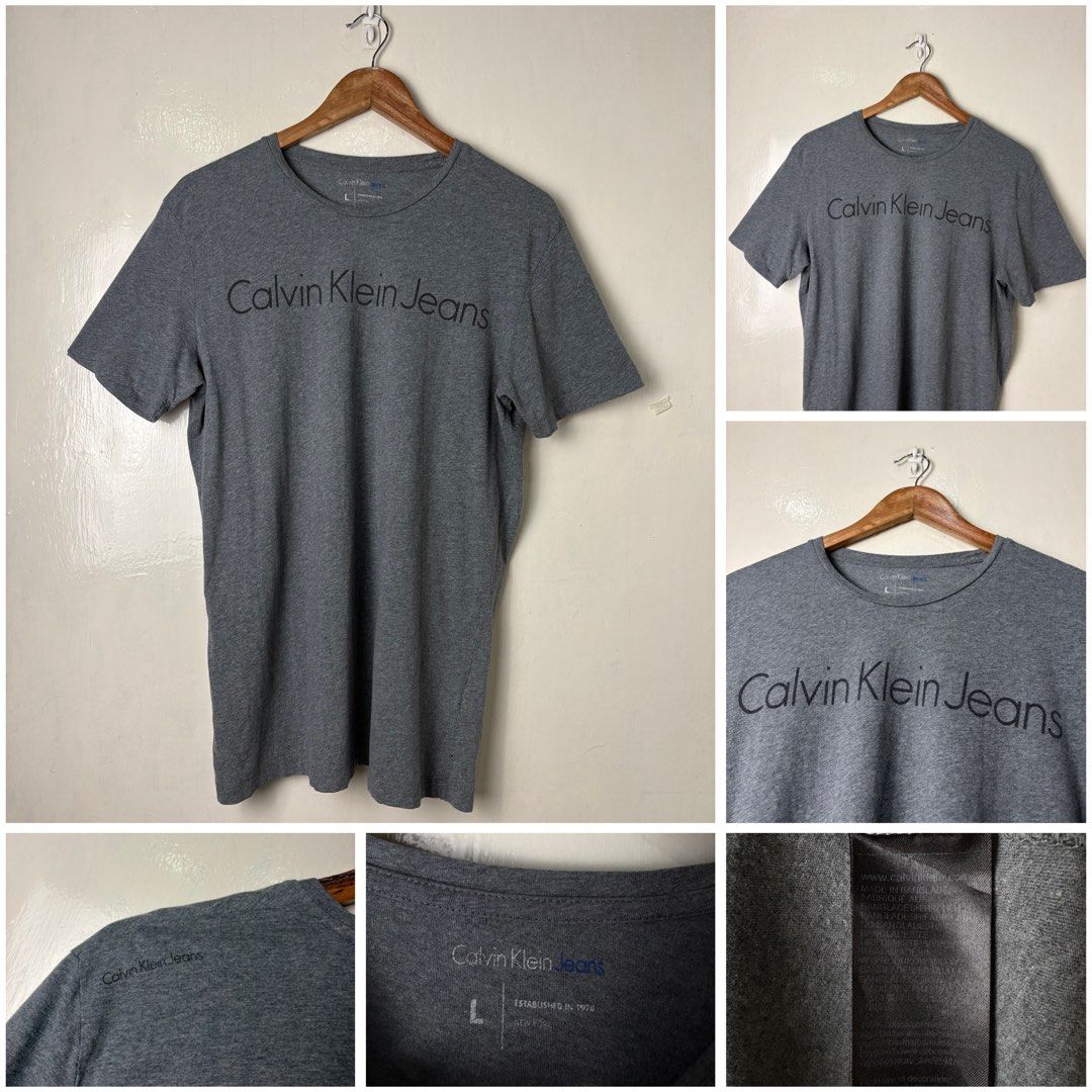 Calvin Klein (Category: Tshirts & Polo Shirts ) located in Quezon City. Submitted by npdthrift25 (Listing ID 1470525601, Image 1). Description: Calvin Klein Excellent Condition Color rate: 9.5/10 No Issue Dimension W 21 L 28 Size: Large 700.
