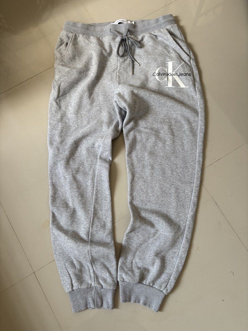 Calvin Klein Monogram Logo Fleece Joggers (Category: Joggers) located in General Santos City (Dadiangas). Submitted by a.rt.eyes (Listing ID 1470409950, Image 1). Description: Calvin Klein Monogram Logo Fleece Joggers Size large on tag Actual waistline 32-36, stretchable Length 41 Excellent condition with no issues Color rate 10/10 Original Located in General Santos City, Mindanao. Shipping fee applies for buyers outside my location. Payment firs