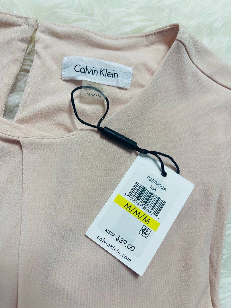 Calvin Klein Sleeveless Pleated Top Size M (Category: Sleeveless) located in Tagaytay City. Submitted by lalalabonita (Listing ID 1470513628, Image 3). Description: Calvin Klein Top cream/ light beige color RFS: not my size Plus sf shouldered by the buyer .